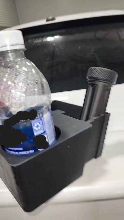 side view of custom BMW E30 cupholders with a water bottle inside of one of the slots on top of a white car