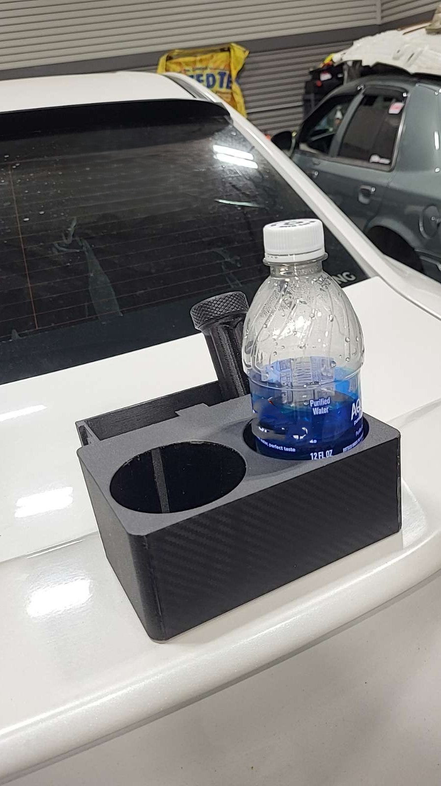 blank water bottle inside of custom BMW E30 cupholder from Alikitty's 3D