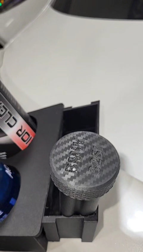 view of the cap of BMW E30 custom cupholders, carbon fiber print on the cap